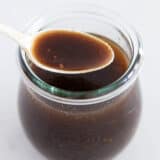 Balsamic vinaigrette in a glass jar.