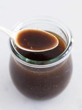 Balsamic vinaigrette in a glass jar.