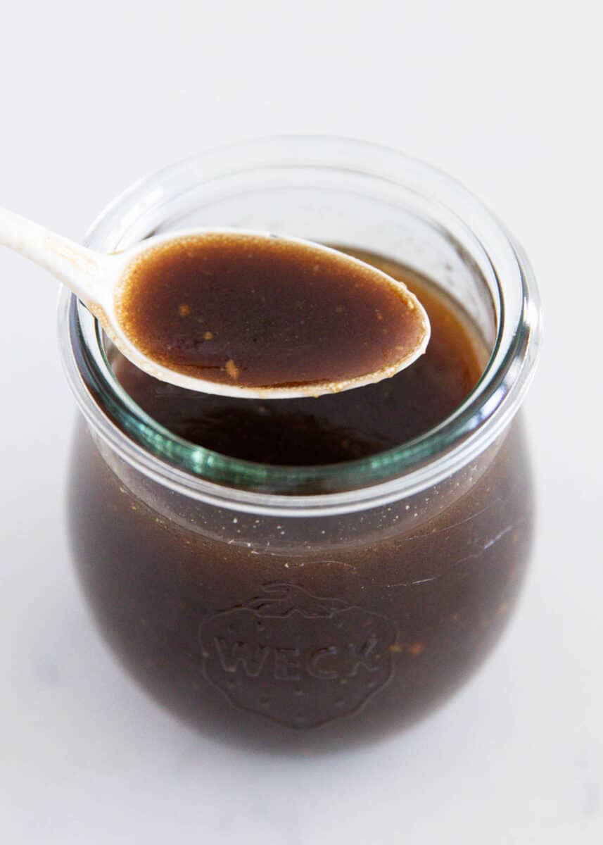 Balsamic vinaigrette in a glass jar.