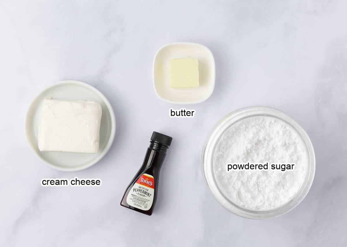 Cream cheese mints ingredients on a marble counter.