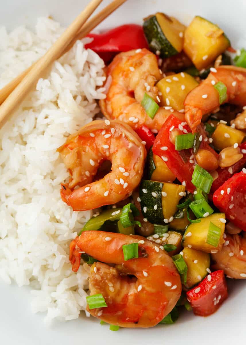 Cooked Kung pao shrimp with rice.