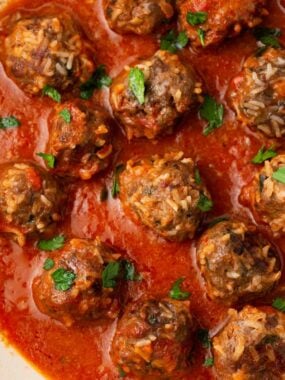 Porcupine meatballs made with ground beef and rice simmered in tomato soup.