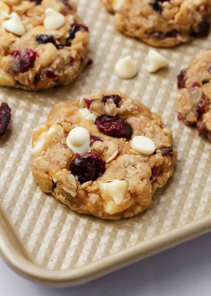 Oatmeal cranberry cookies on a baking sheet.