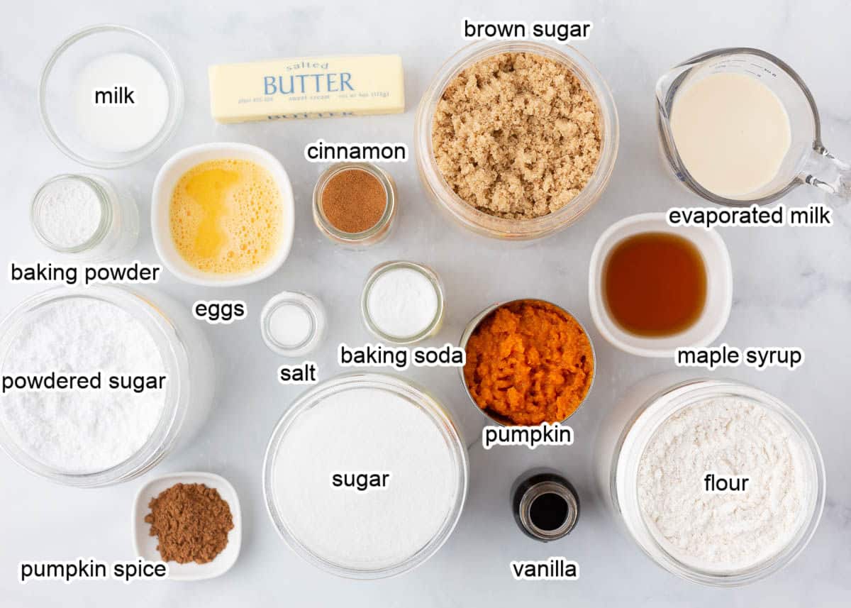 Pumpkin coffee cake ingredients on marble counter.