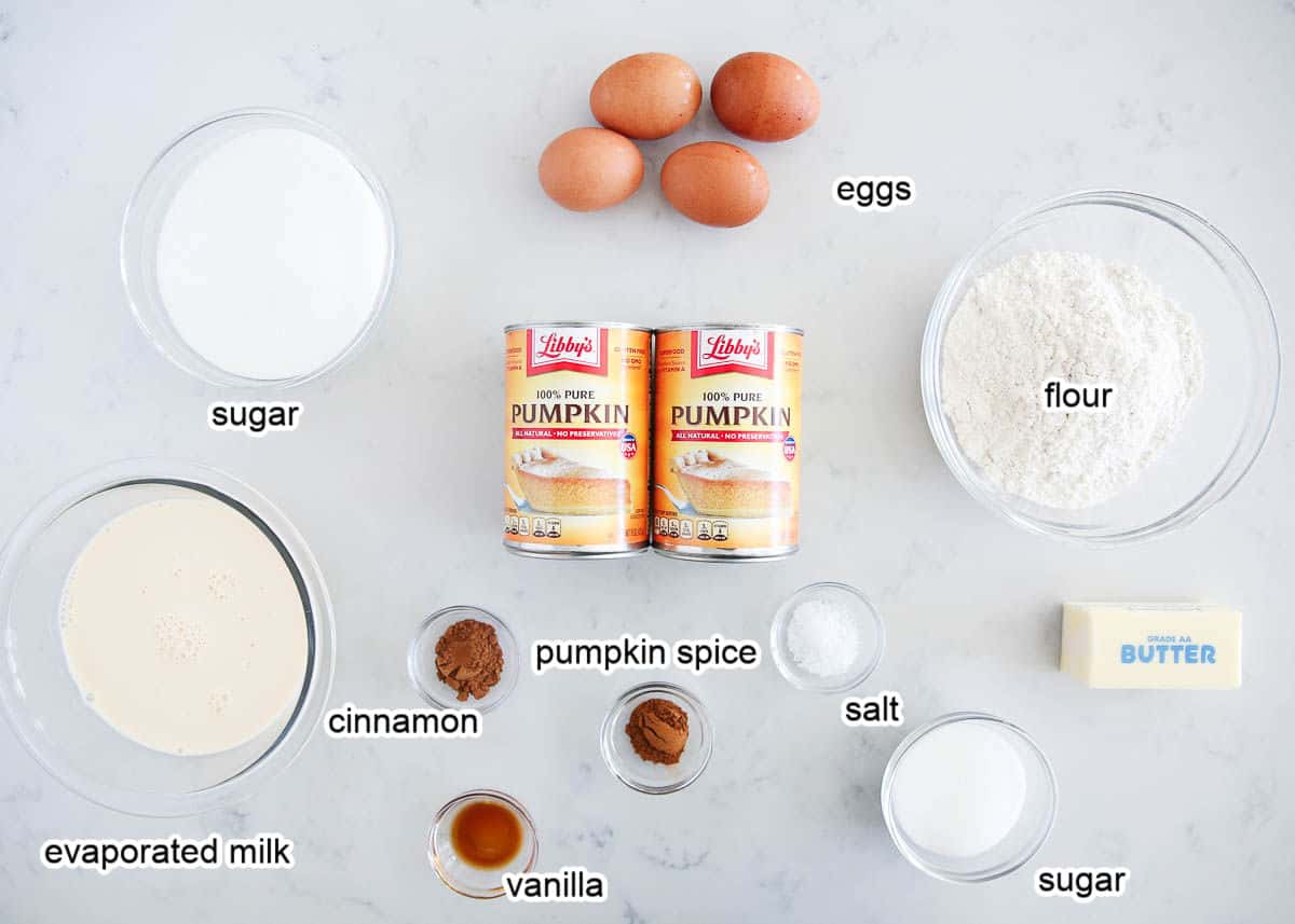 Pumpkin pie bar ingredients on a marble countertop.