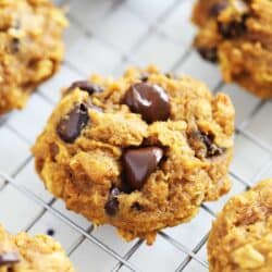 Pumpkin oatmeal chocolate chip cookies on cooling rack.