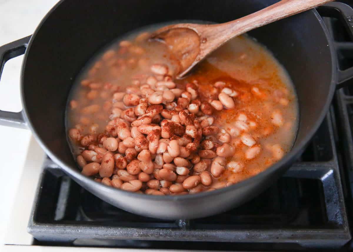 Pinto beans in a pot on the stove.