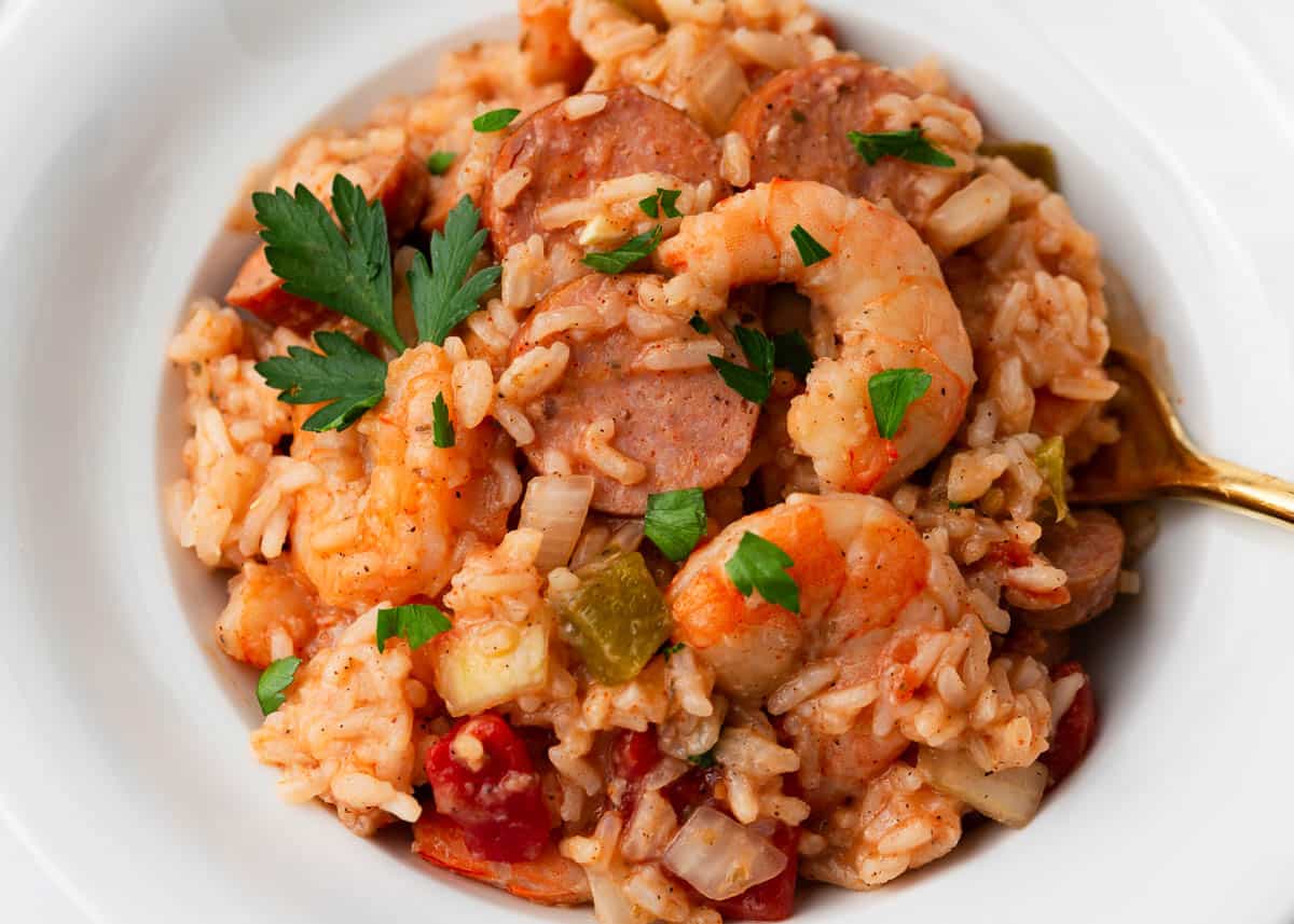 Jambalaya in a white bowl.