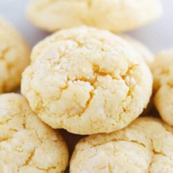 Stacked gooey butter cookies on countertop.