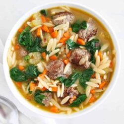 Italian Wedding soup in a white bowl.