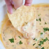 Dipping chip into rotel dip.