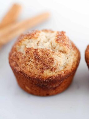Snickerdoodle muffin on the countertop.
