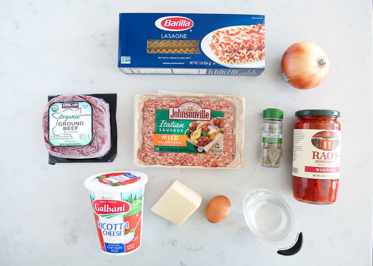 Crockpot lasagna ingredients on counter.