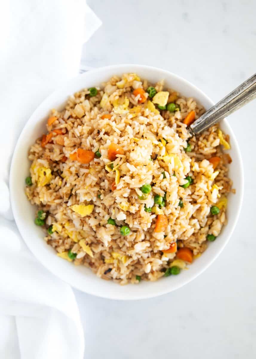 Fried rice in a white bowl.