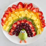 Turkey fruit platter on a white plate.