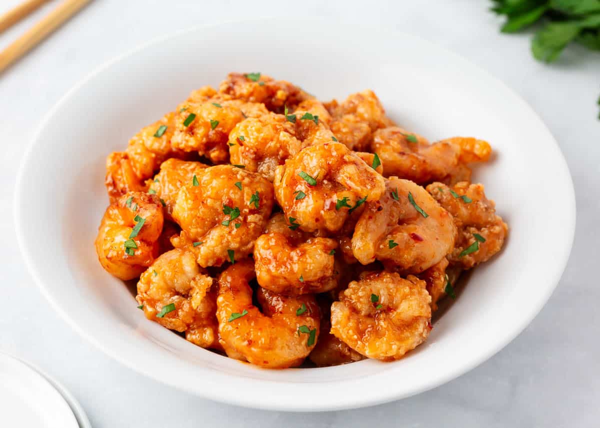 Bang bang shrimp in a white bowl.