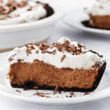 A slice of chocolate French silk pie on a plate.