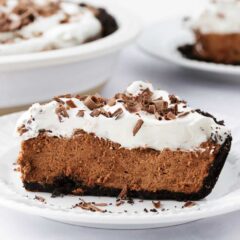 A slice of chocolate French silk pie on a plate.