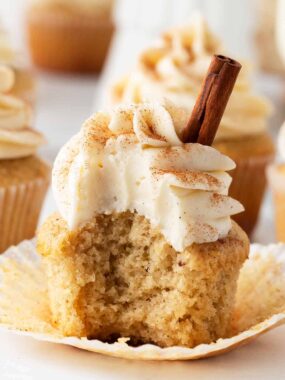 Eggnog Cupcake with a Bite Missing.