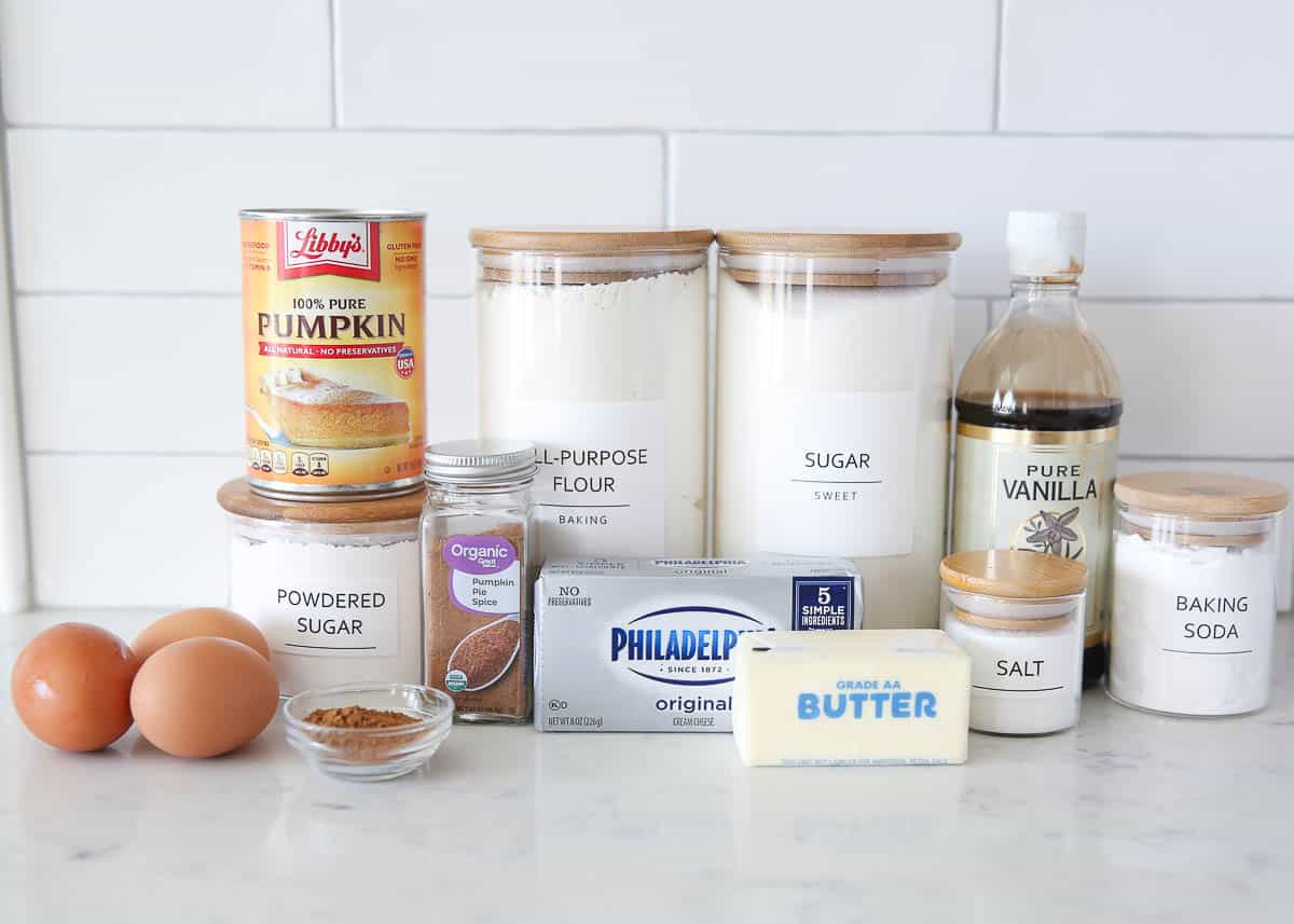 Pumpkin roll ingredients on countertop.