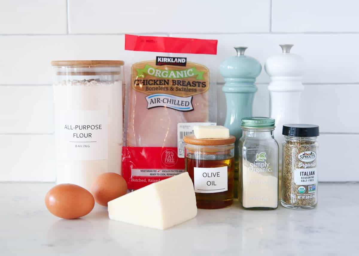 Parmesan crusted chicken ingredients on counter.