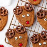 Reindeer cookies on a wire cooling rack.