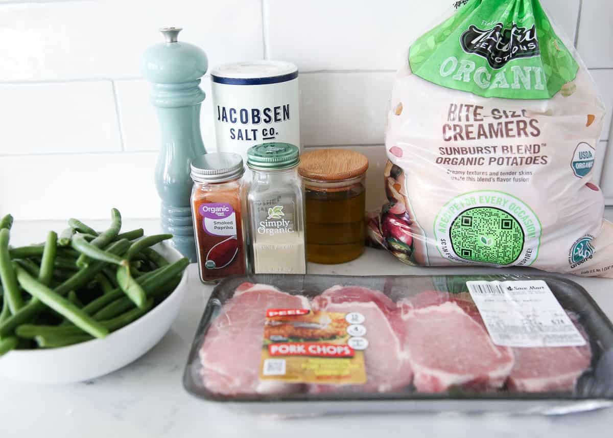 Pork chop ingredients on counter.