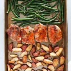 Sheet pan pork chops with potatoes and green beans.