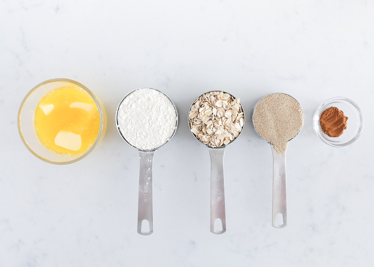 Streusel ingredients on a marble counter.