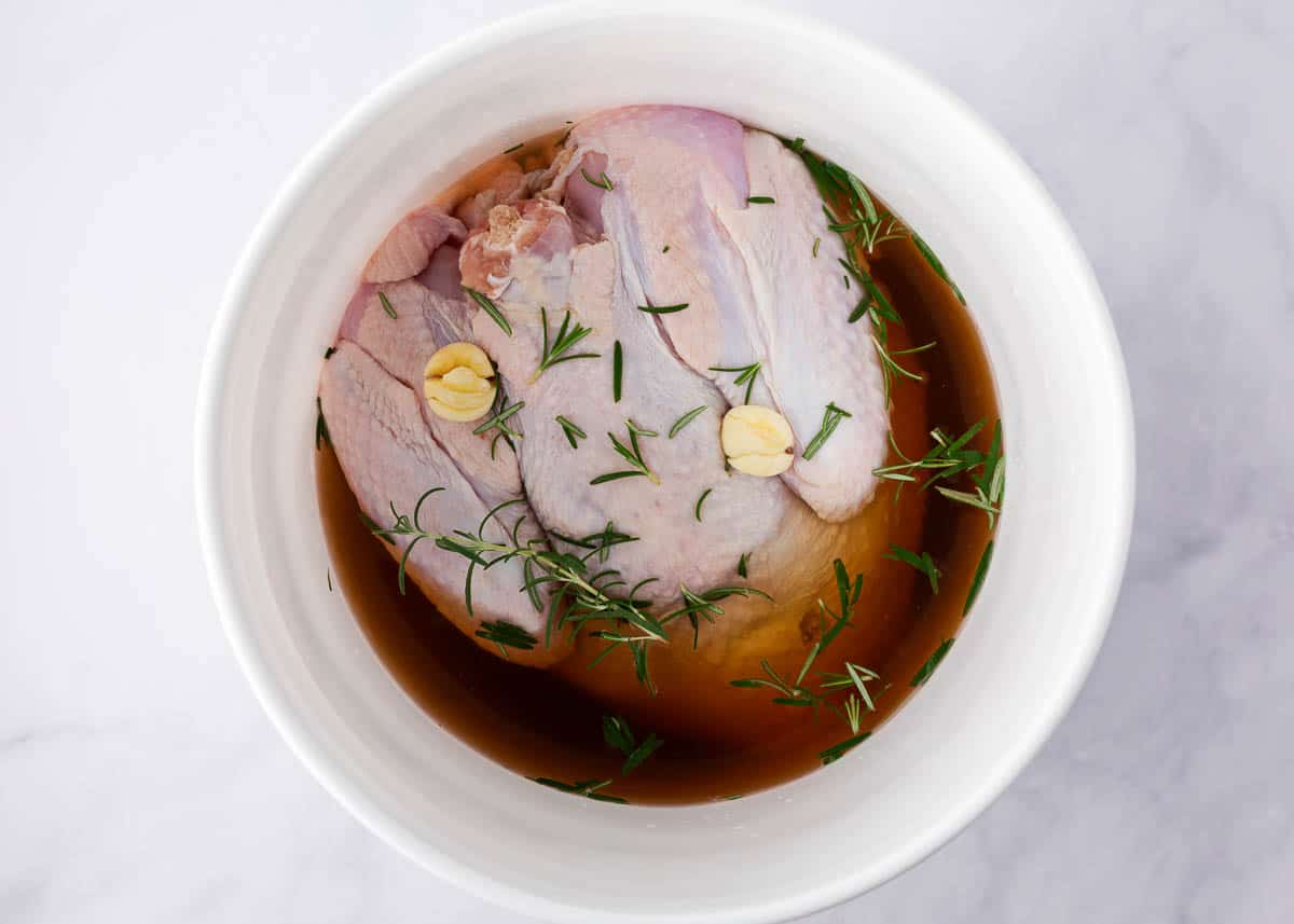 Using a turkey brine recipe to brine turkey.