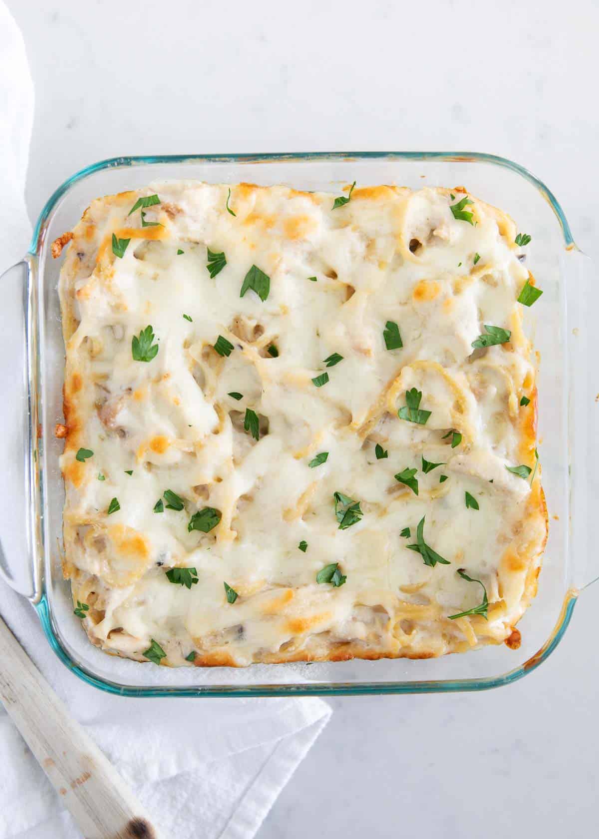 Turkey tetrazzini in a glass dish.