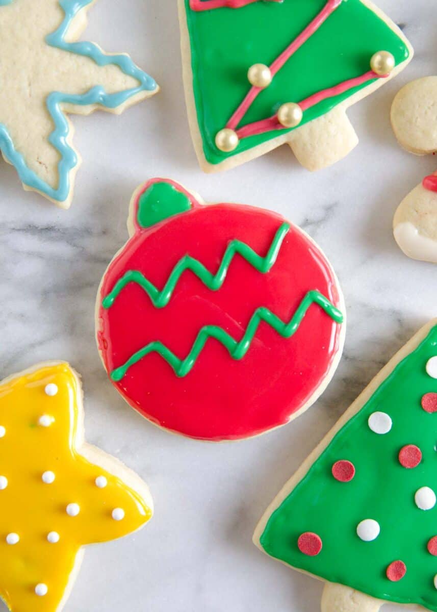 Christmas sugar cookie recipes on the counter.