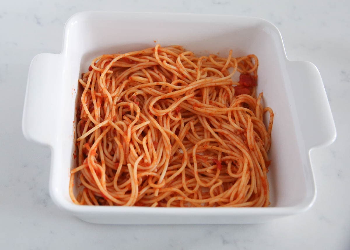 Spaghetti spread in a baking dish.