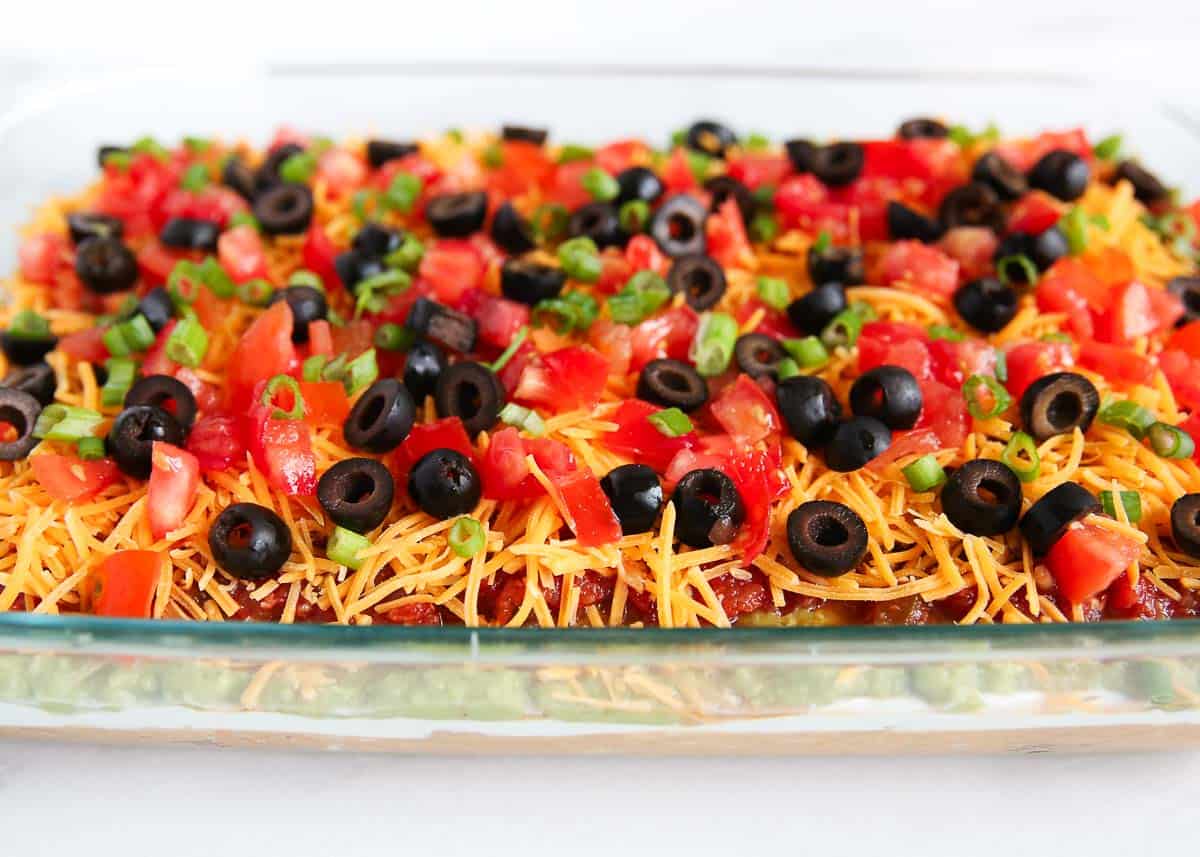 7 layer dip in a glass dish. 