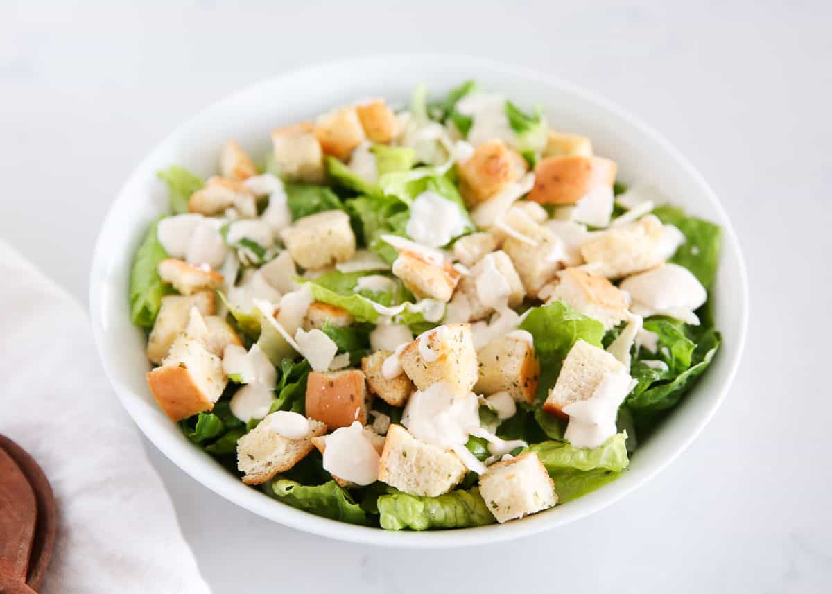 Caesar salad in a bowl with croutons.