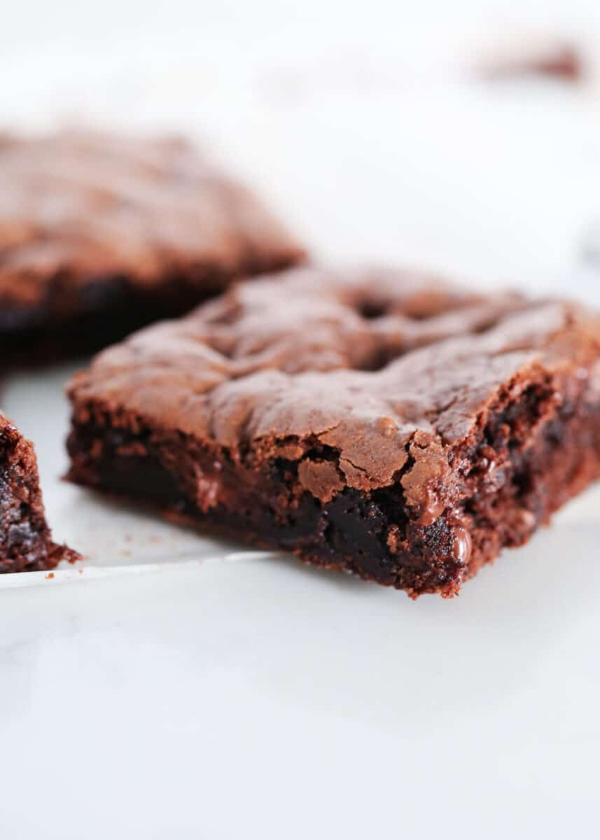 Slice of brownie on the counter.
