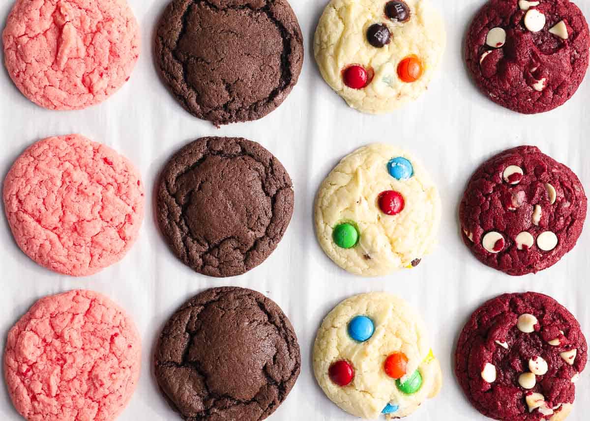 Cake mix cookies on white parchment paper.