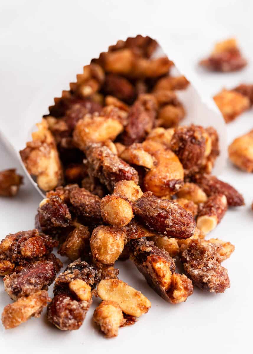 Candied nuts in a white bag.