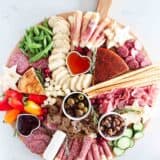 Charcuterie board on a marble counter.