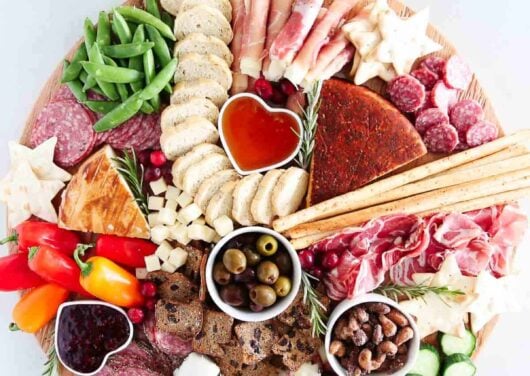 Charcuterie board on a marble counter.