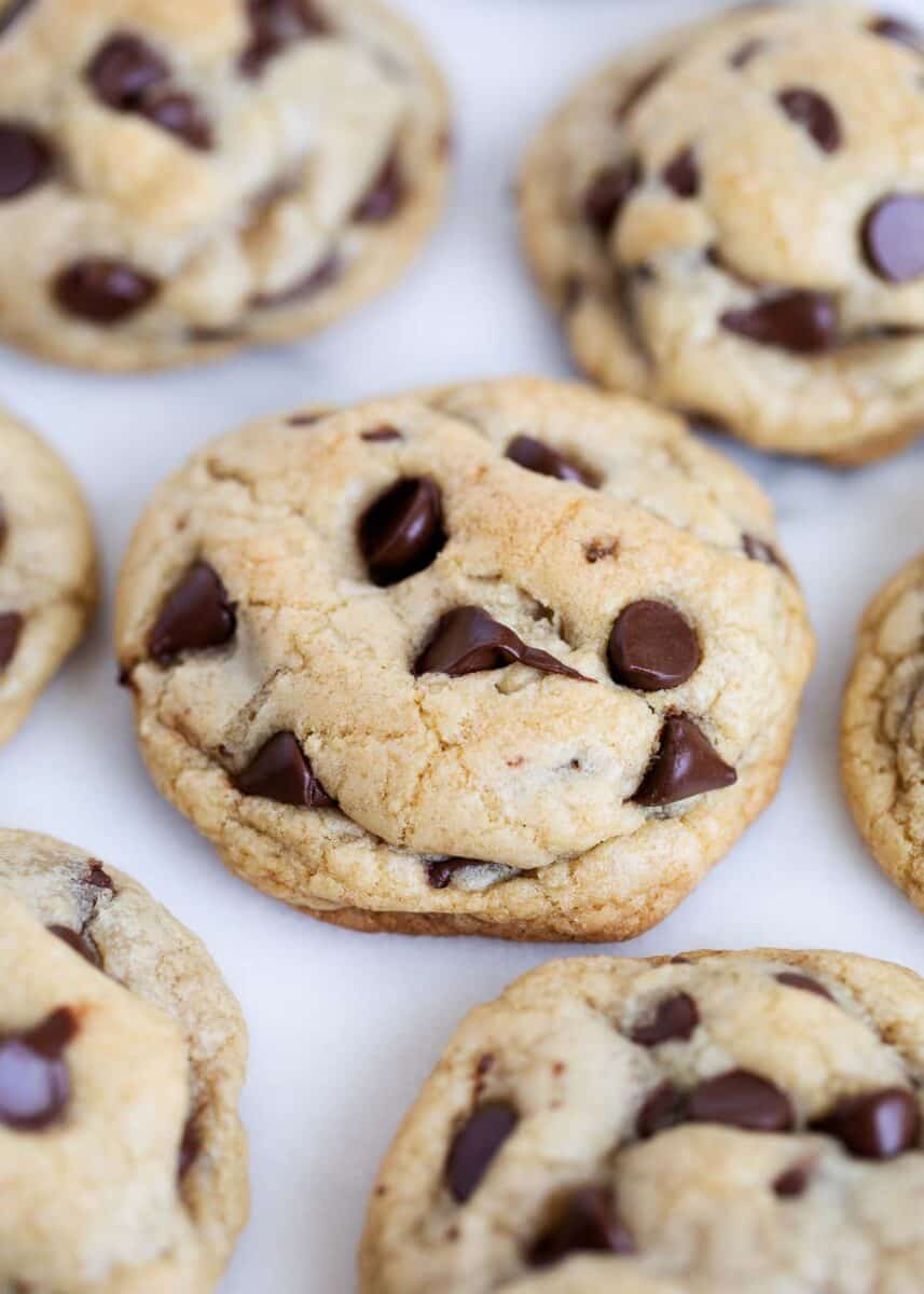 Chocolate chip cookies on a counter.