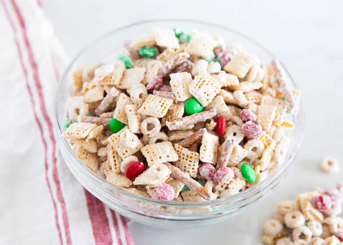 Christmas chex mix recipe in a bowl. 