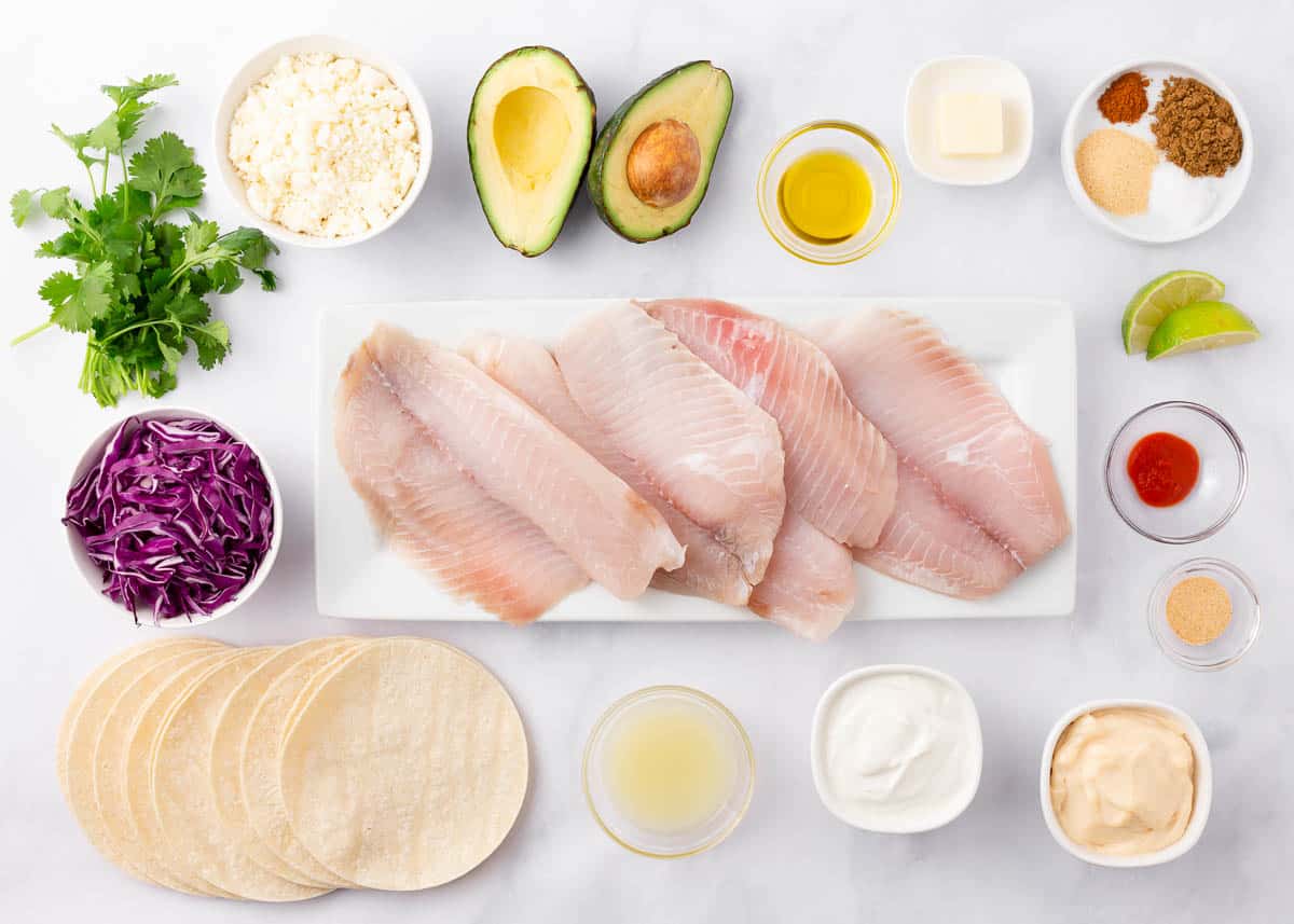 Fish taco ingredients on a counter.