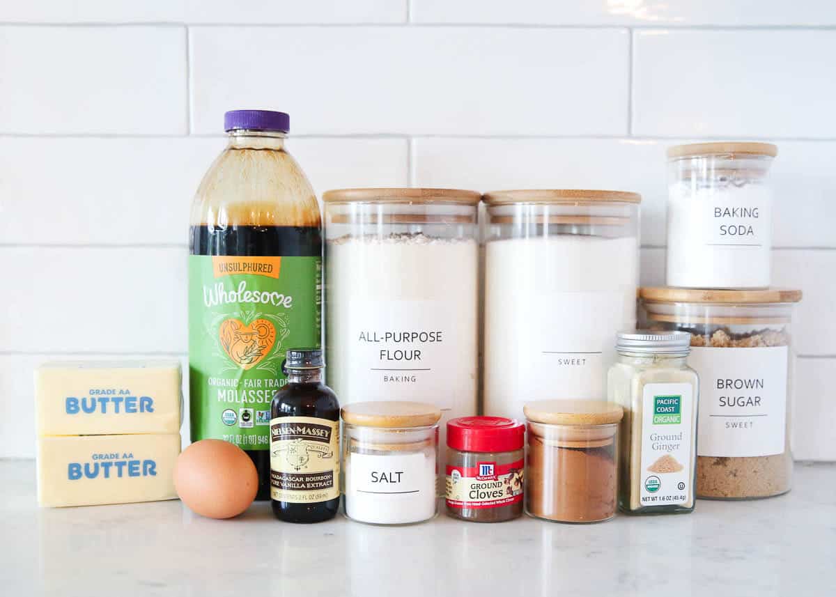 Gingerbread man cookie ingredients on counter.