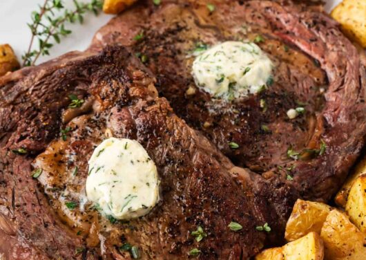 Steak cooked in the oven on a plate.