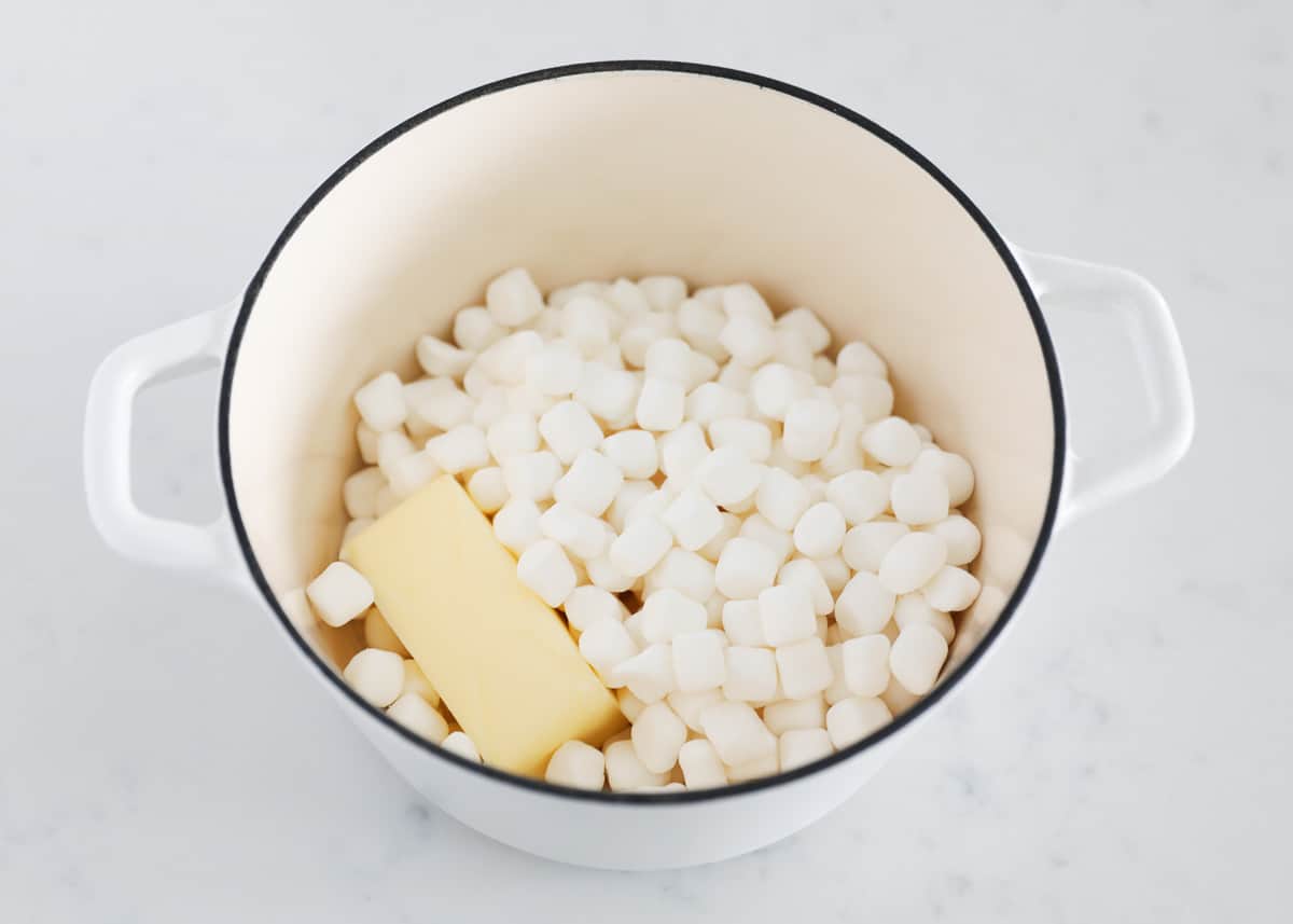 Marshmallows and butter cooking a pot.