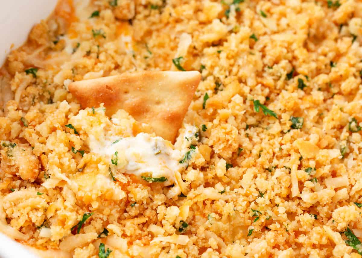 Jalepeno popper dip with pita chip.