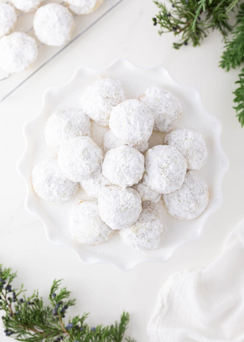 Mexican wedding cookies on a plate.