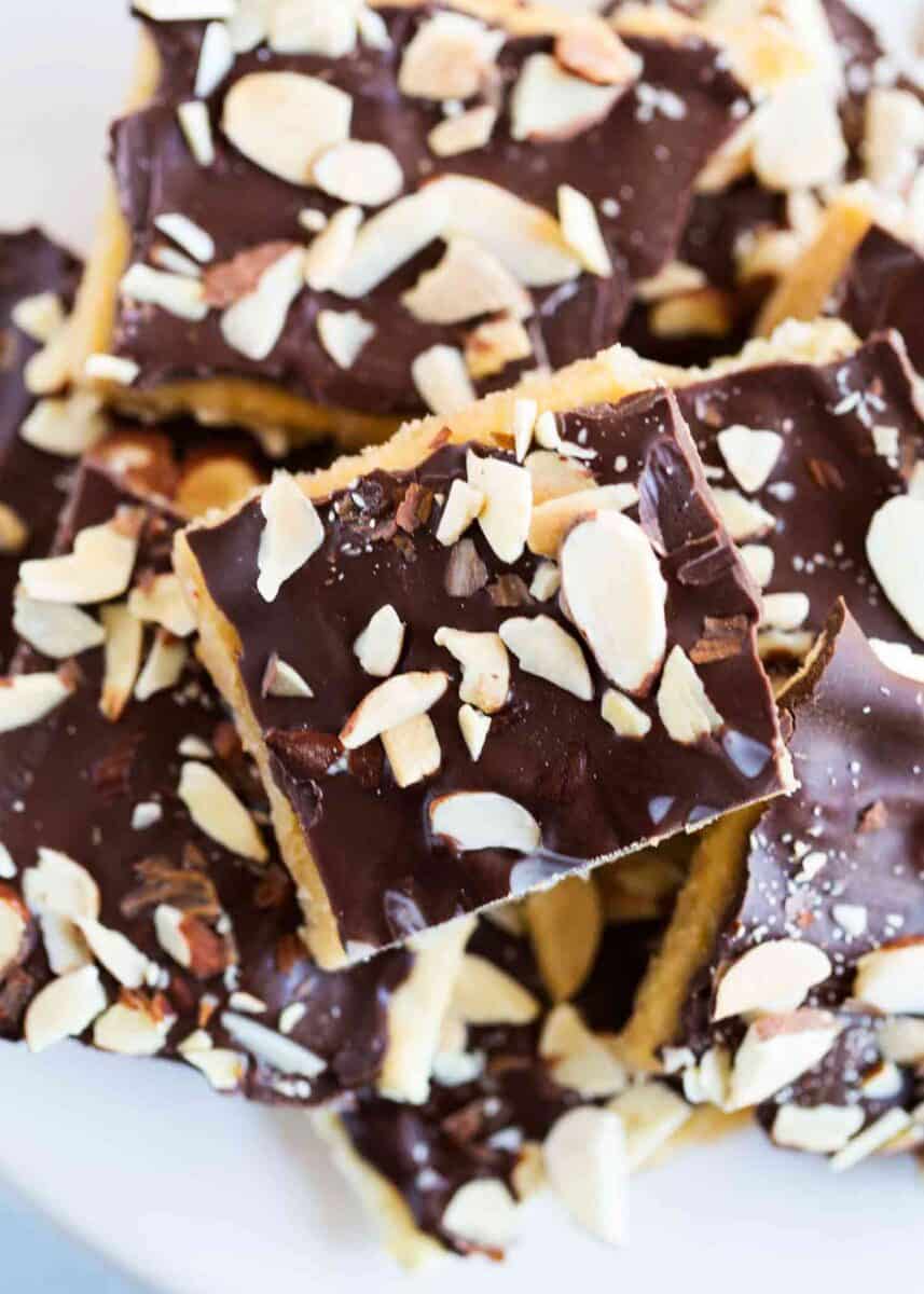 Saltine cracker toffee on a white plate.