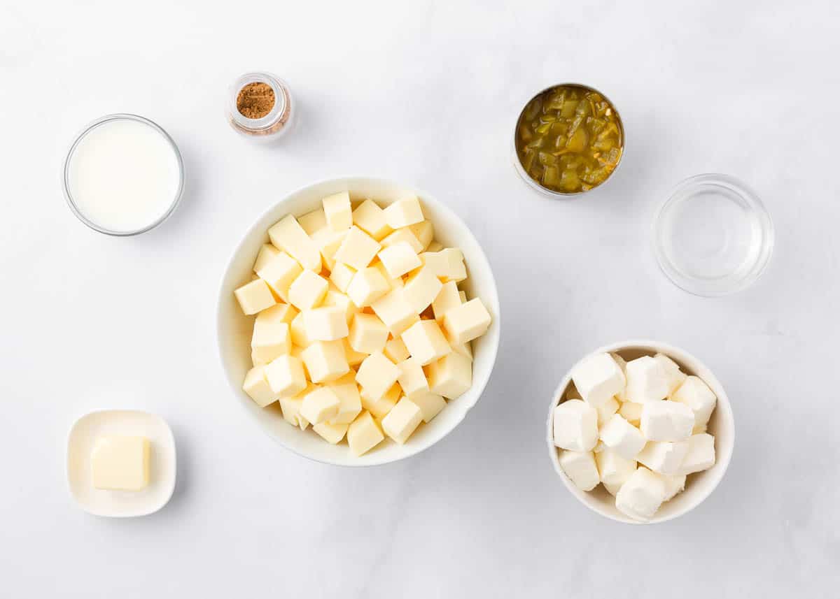 Queso blanco ingredients on marble counter.